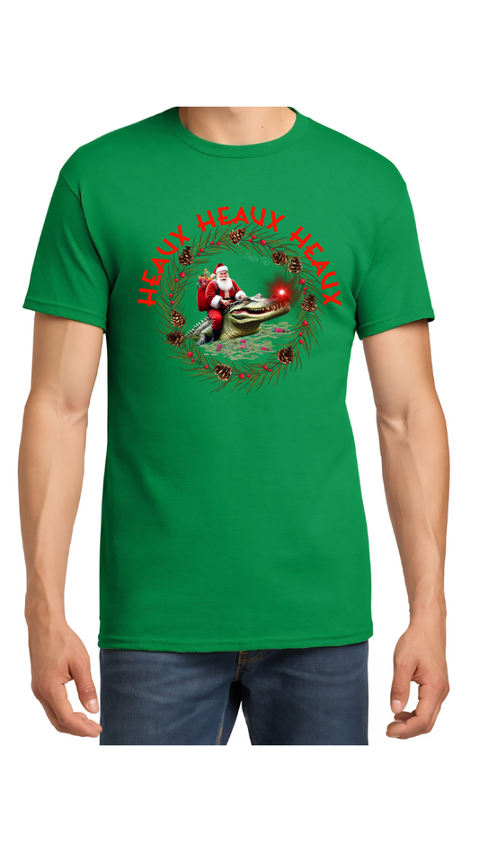 Green t-shirt with a graphic design featuring Santa Claus Rising a Gator.